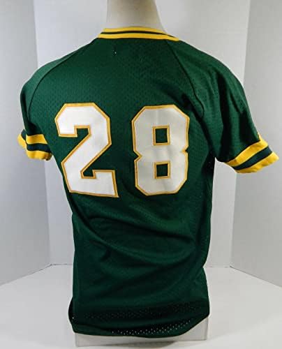 1980 -тите години на Атлетика #28 на Оукланд А користеше практика за капење на зелена дрес 220 - Игра користена МЛБ дресови